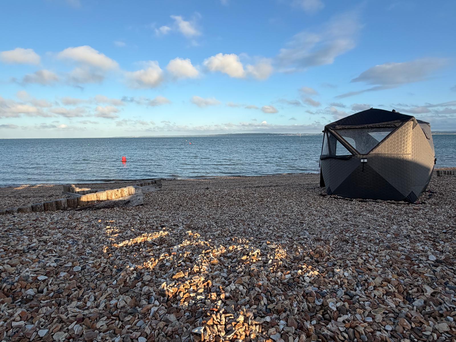 NERVA pop-up sauna tent on the beach on the Hampshire coast